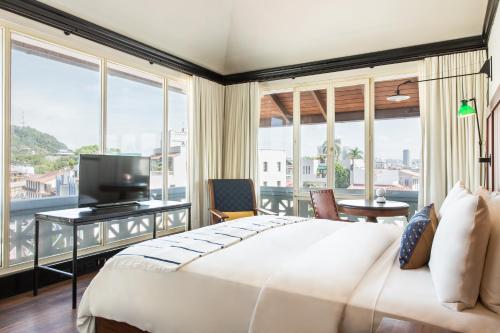 Postel nebo postele na pokoji v ubytování American Trade Hotel