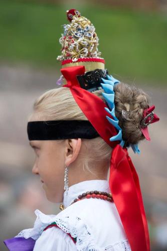 a young woman wearing a hat with a crown at Garni Franca b&b in Selva di Val Gardena
