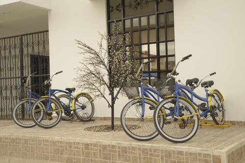 a group of bikes parked next to a building at Hotel Anapoima in Anapoima