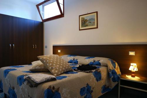 Llit o llits en una habitació de Il Balcone delle Dee
