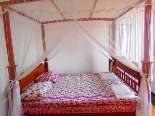 Cama o camas de una habitación en Hopson Resort And Apartment