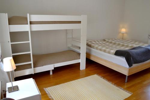 Postel nebo postele na pokoji v ubytování Villa Baumgartner