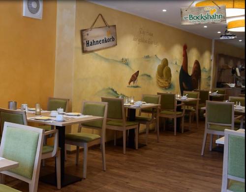
Ein Restaurant oder anderes Speiselokal in der Unterkunft Hotel und Landgasthof Zum Bockshahn 
