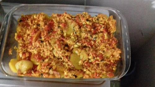 a plastic container of food with vegetables in it at Guesthouse Dritan Tethorja in Theth