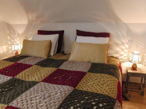 En eller flere senge i et værelse på 't Uitzicht