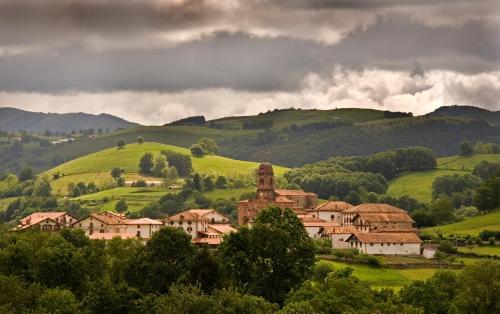 a village in the middle of a green hills at Casa Rural Zigako Etxezuria in Ziga
