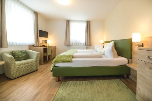 Ένα ή περισσότερα κρεβάτια σε δωμάτιο στο Gasthof - Hotel Zur Post