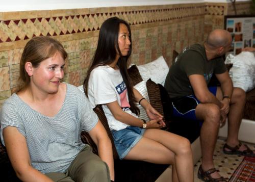 a group of people sitting on a couch at Hostel Amour d'auberge in Marrakech