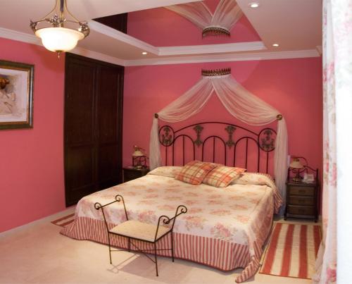 Postelja oz. postelje v sobi nastanitve Hotel los Girasoles