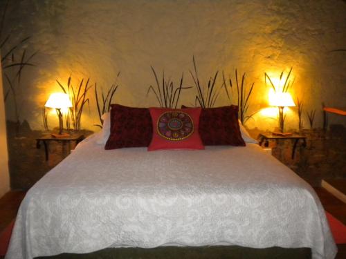Postel nebo postele na pokoji v ubytování Posada La Masía