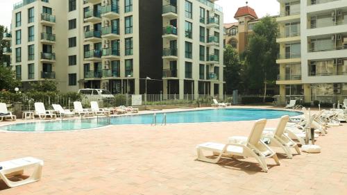 The swimming pool at or close to Economy Apartment in Sunset Beach 2 Complex