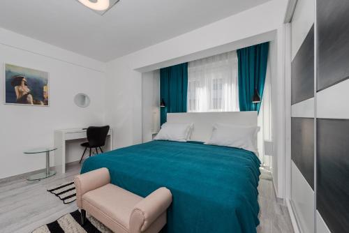 Postel nebo postele na pokoji v ubytování Luxury Apartments Villa Morea