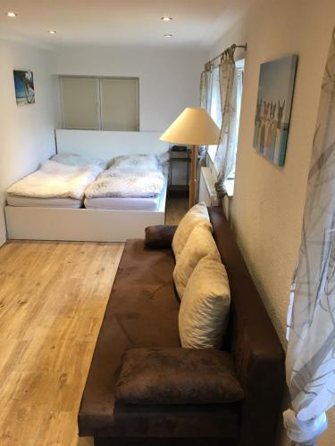 Postel nebo postele na pokoji v ubytování Ferienwohnung auf dem Resthof