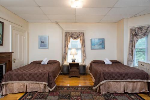 Posteľ alebo postele v izbe v ubytovaní The Farrington Inn