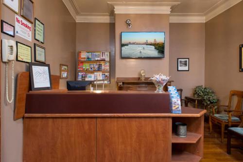 a cashier counter in a waiting room at The Farrington Inn in Boston