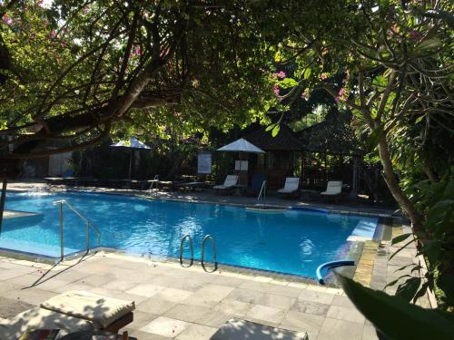 Бассейн в Bumi Ayu Bungalow Sanur или поблизости