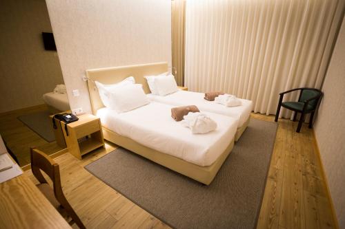 Katil atau katil-katil dalam bilik di Lam Hotel Celorico de Basto