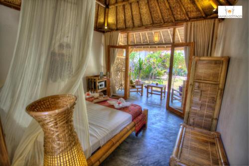 אזור ישיבה ב-Bambu Cottages