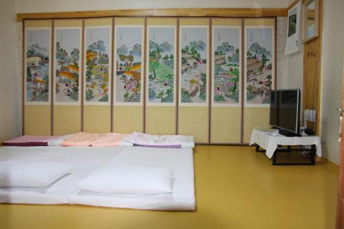 Кровать или кровати в номере Dajayon Hanok Stay