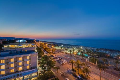 an aerial view of a city at night at Hotel Europa Beach Village in Giulianova