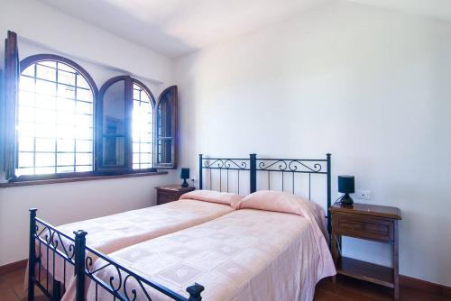 Cama ou camas em um quarto em Villa La Verna