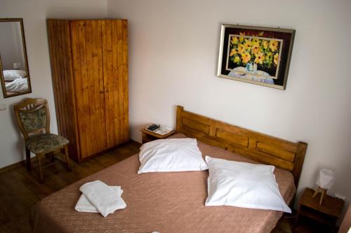 Un pat sau paturi într-o cameră la Casa Diana