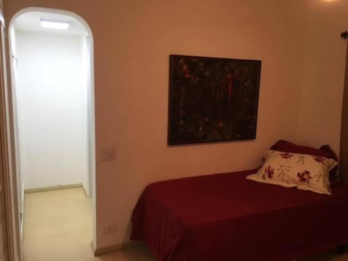 A bed or beds in a room at Paulista Flat