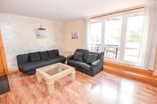 Χώρος καθιστικού στο Panoramic Apartment Nida