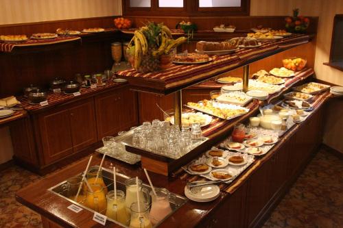 a buffet line with many different types of food at Remanso in Punta del Este