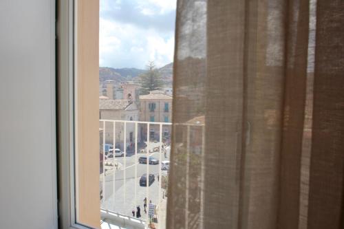 a view of a city street from a window at Townhouse Tropea in Tropea