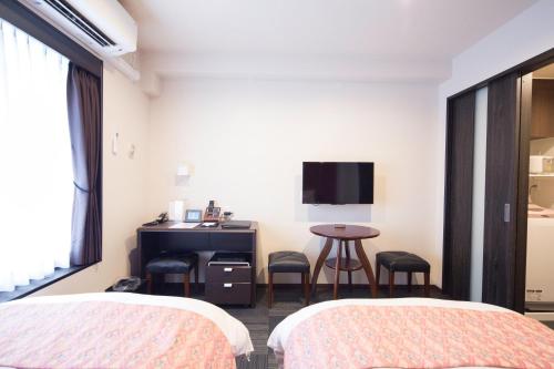 Letto o letti in una camera di Gion HANNA STAY