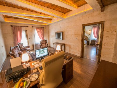 an aerial view of a living room with a desk at Kapadokya Hill Hotel & Spa (12+) in Nevsehir