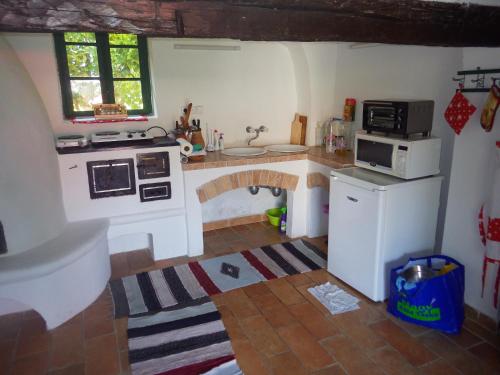 A kitchen or kitchenette at Country house Balaton