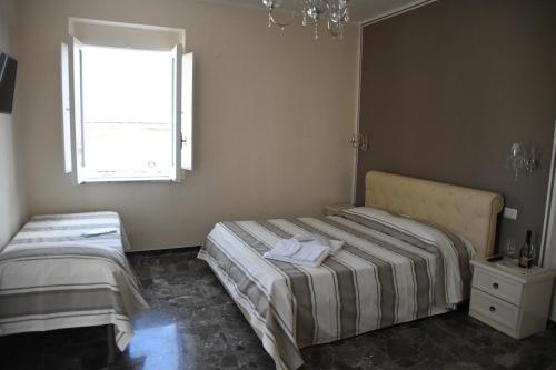 Letto o letti in una camera di B&B The Tower