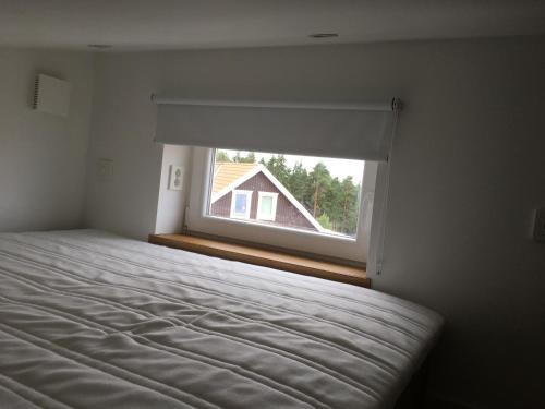 Postel nebo postele na pokoji v ubytování Guest Haush Ånneröd