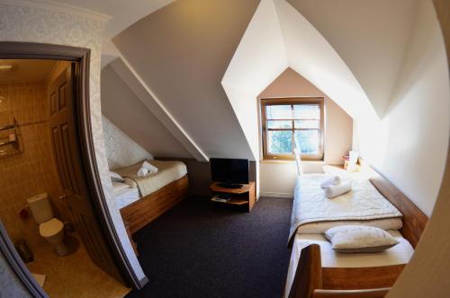 Postel nebo postele na pokoji v ubytování Bonato Hotel