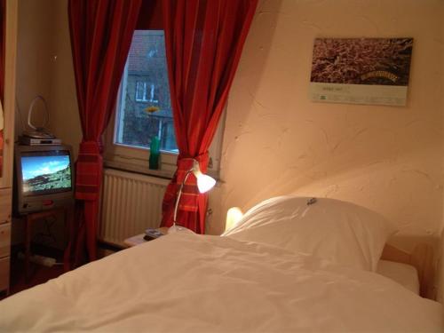 Letto o letti in una camera di Deutsches Haus