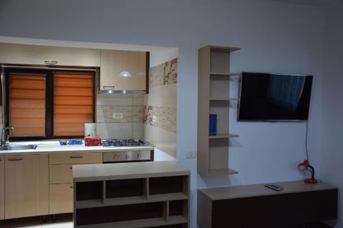 A kitchen or kitchenette at Comfort ApartHotel