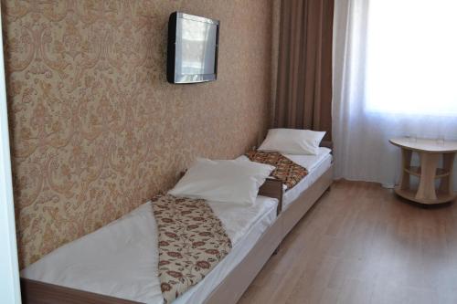Katil atau katil-katil dalam bilik di Hotel Alash