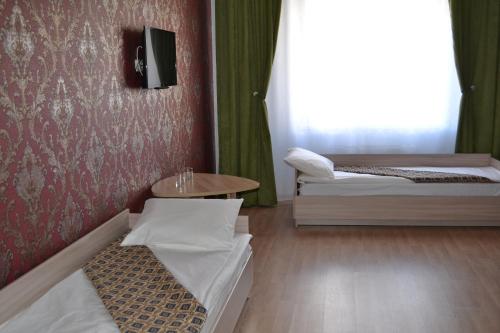 Katil atau katil-katil dalam bilik di Hotel Alash