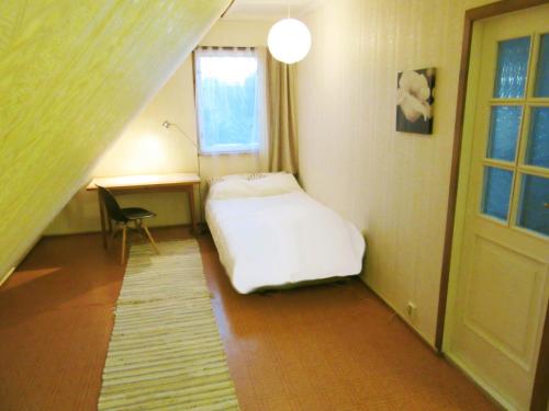 Tempat tidur dalam kamar di Villa Lille
