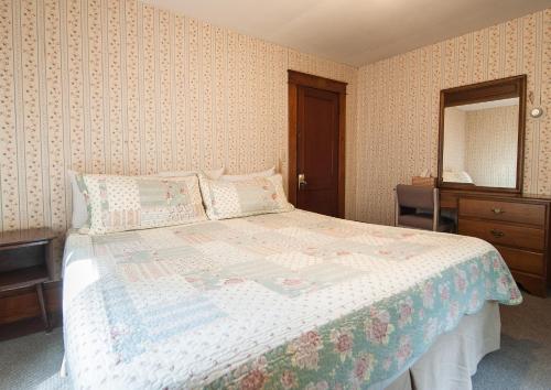 Katil atau katil-katil dalam bilik di Profile Motel & Cottages