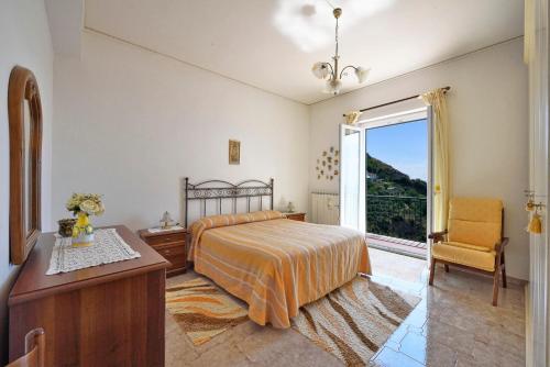 En eller flere senge i et værelse på Villa San Giuseppe