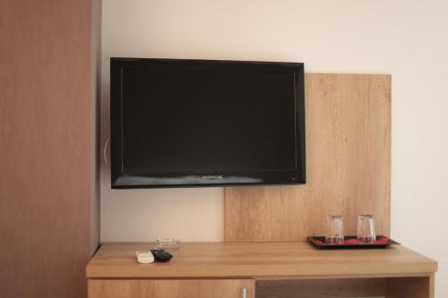 TV a/nebo společenská místnost v ubytování Hypnotique