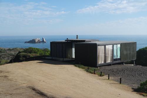 a house on a hill overlooking the ocean at OMZ - Olas de Matanzas in Matanzas