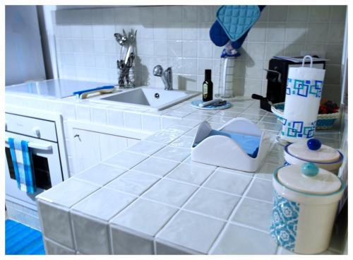 A kitchen or kitchenette at TorreBlu Residence