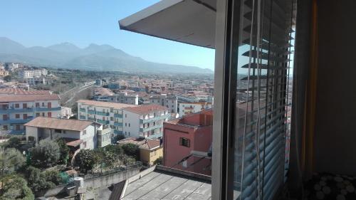 a view of a city from a building at Appartamento Monticello Vista Mare in Scalea