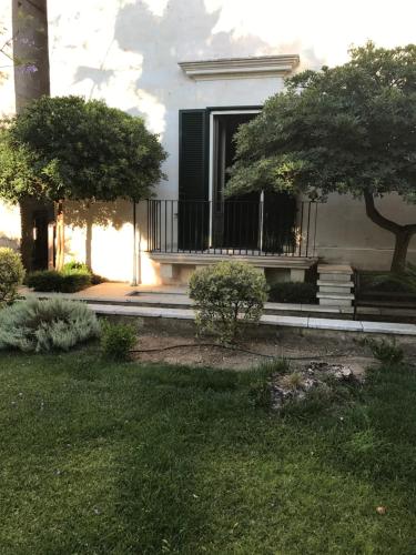 Jardin de l'établissement Sine Tempore B&B