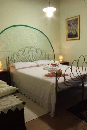 A bed or beds in a room at Casale San Marco B&B