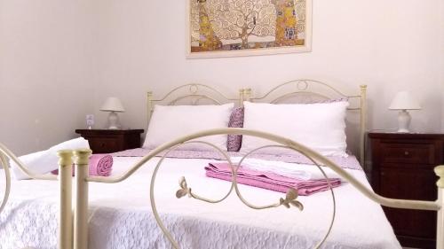 Un pat sau paturi într-o cameră la Agriturismo Le Scerze